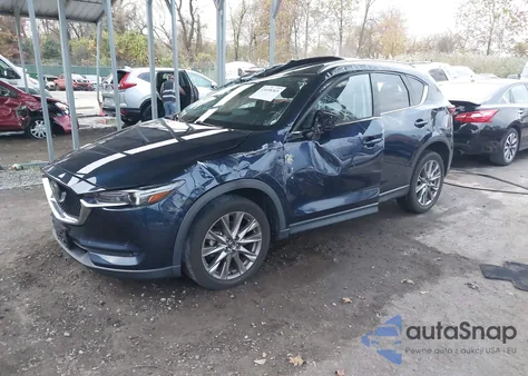 2021 Mazda Cx-5 Grand Touring z USA, uszkodzony, nr VIN JM3KFBDM1M1427615